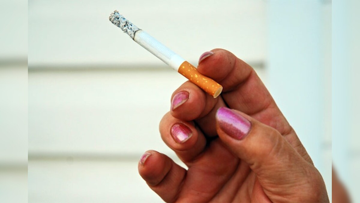 Saudi man divorces wife for having cigarette in her bag - News18