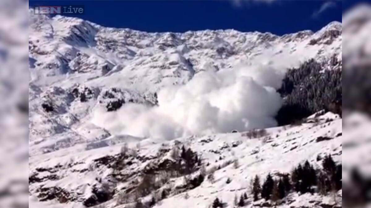 Watch Giant avalanche comes crashing down through the Italian Alps