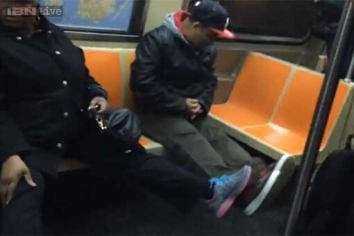 'Rat on the train!' Video of New York commuters reacting in panic to a rat on a subway train goes viral on YouTube