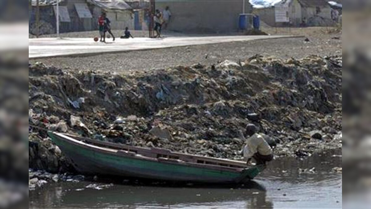 Slum Defecate A billion people still defecate in public, most in India: UN