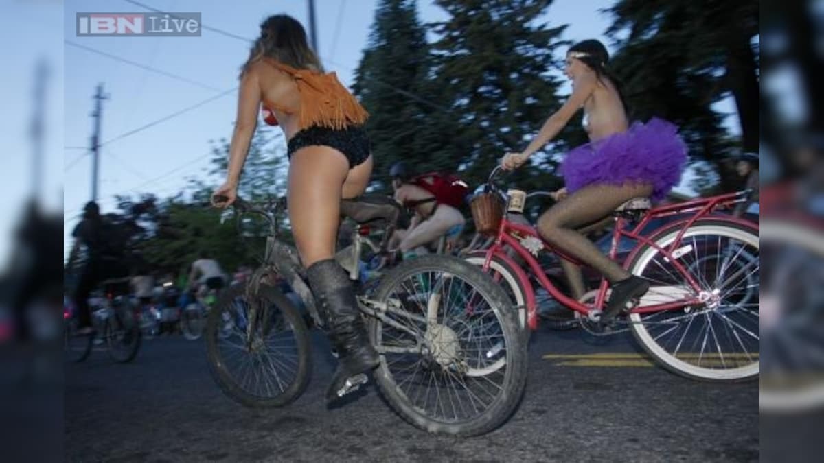 Thousands of naked bicyclists stage festive Portland protest ride - News18