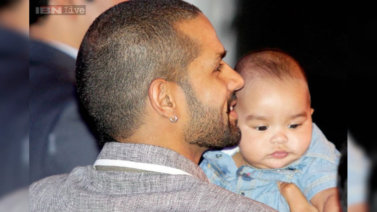 Snapshot Aww! Shikhar Dhawan turns heads as he poses with his adorable son