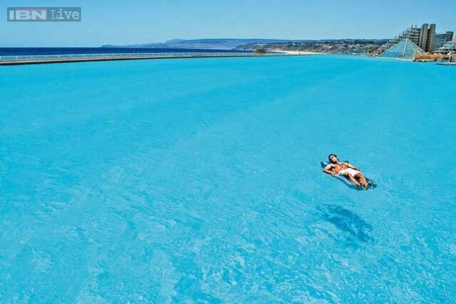 Photos: 3324 ft long, covering an area of 19.7 acres - dive right inside the world's largest swimming pool in Chile!