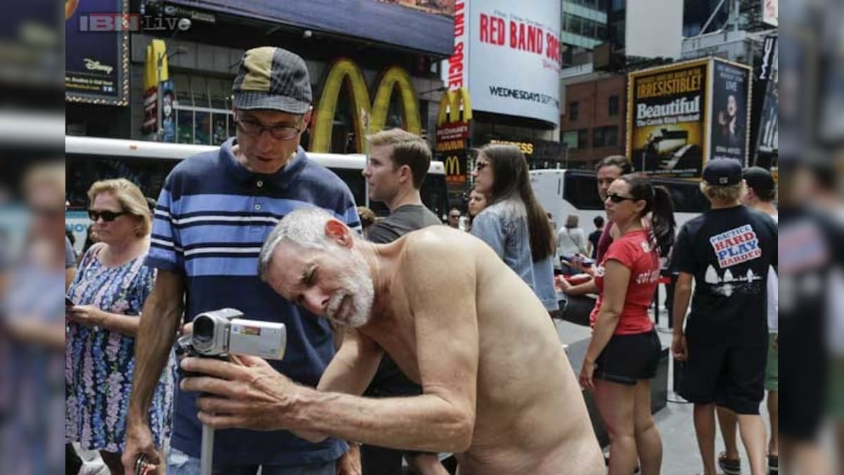 Political candidate strips naked at Times Square to campaign for the right  to be nude in public - News18