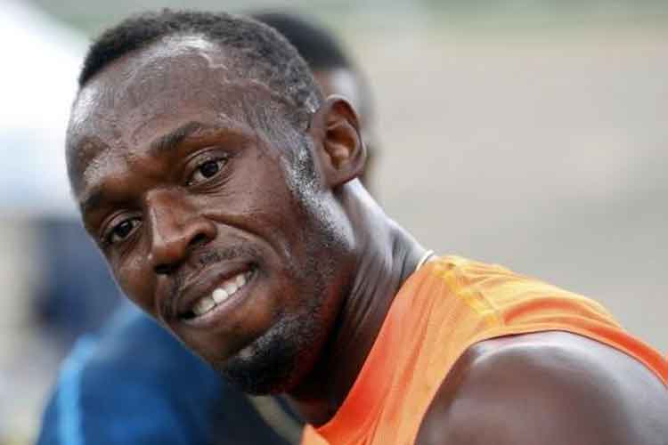 Bolt wins 200m, Powell takes 100 in rainy Ostrava image image