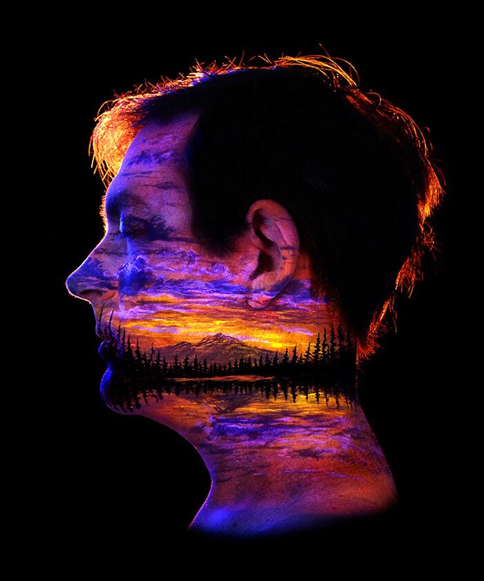 This man paints magically beautiful art with UV paint on the human body