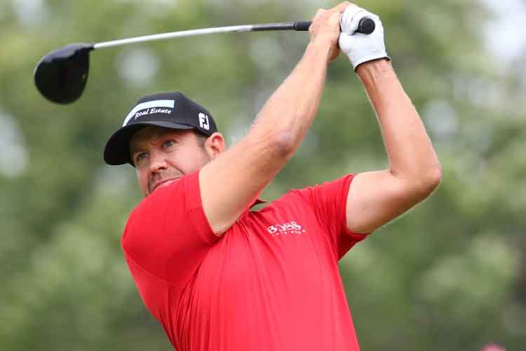 Eric Compton grabs share of Wyndham Championship lead, Tiger Woods two