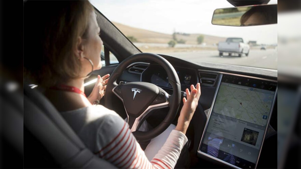 Tesla unveils autopilot system, lets cars change lanes themselves