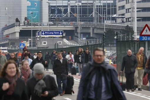Belgian PM says Brussels hit by 'blind, violent, cowardly' attacks