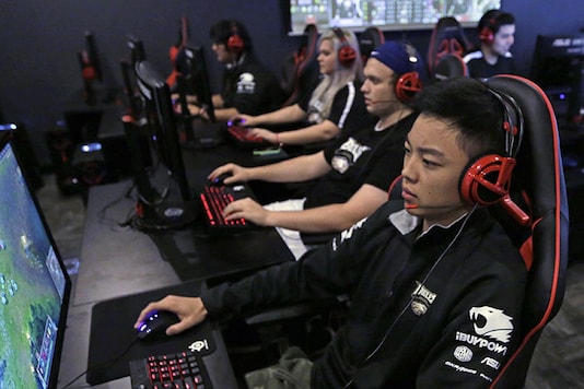 In this September 23, 2014 file photo, Robert Morris University Illinois freshmen practice playing the video game 'League of Legends' with their collegiate teammates at their on-campus training facility in Chicago. (AP Photo/M Spencer Green) In this September 23, 2014 file photo, Robert Morris University Illinois freshmen practice playing the video game 'League of Legends' with their collegiate teammates at their on-campus training facility in Chicago. (AP Photo/M Spencer Green)