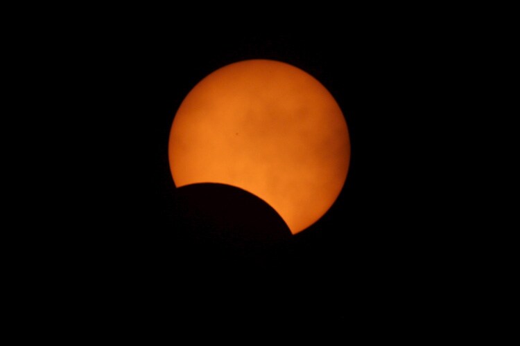 Clouds over Indonesia obscure total eclipse of the sun for many
