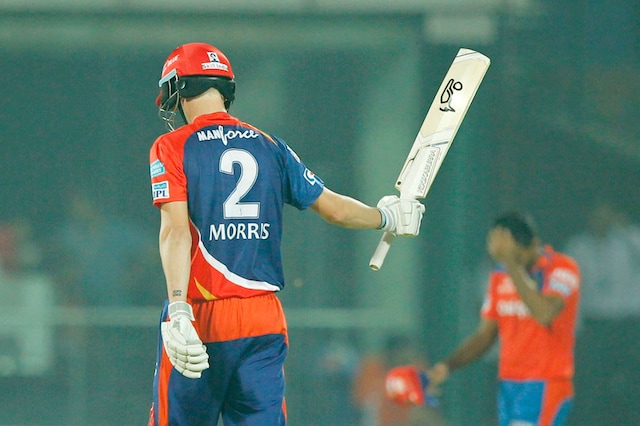 Chris Morris raises his bat after scoring fifty in just 17 balls, the fastest half century of the season. (Photo Credit: BCCI)
