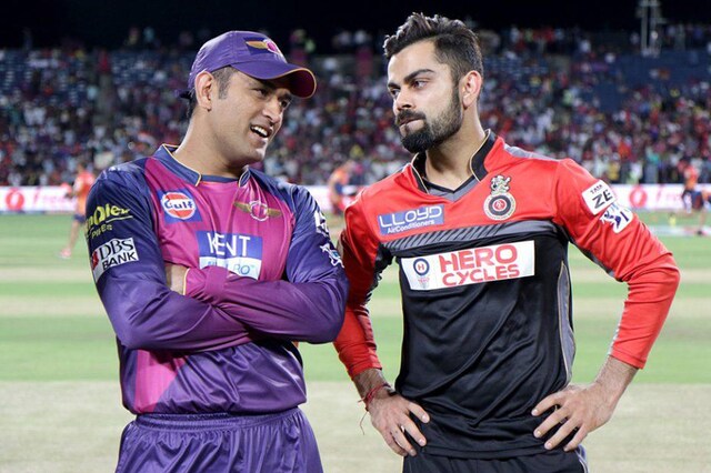 RPS captain MS Dhoni and RCB skipper Virat Kohli talking before an IPL-9 match between the two teams. (BCCI Photo)