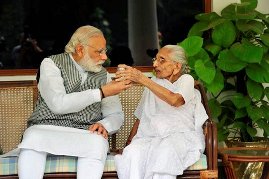 Modi with his mother Heeraben at the 7RCR in New Delhi/File photo Modi with his mother Heeraben at the 7RCR in New Delhi/File photo