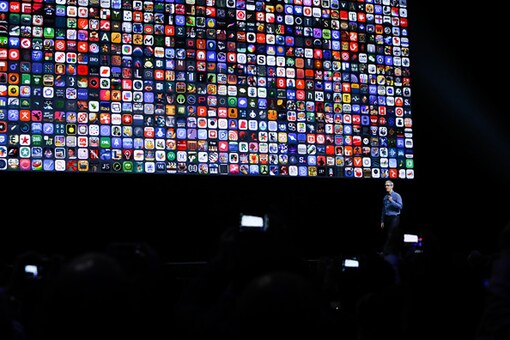 Apple CEO Tim Cook delivers the keynote presentation at Apple's annual Worldwide Developers Conference at the Bill Graham Civic Auditorium in San Francisco, California, on June 13, 2016. / AFP / GABRIELLE LURIE (Photo credit should read GABRIELLE LURIE/AFP/Getty Images)