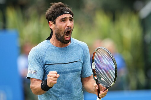Marcos Baghdatis Advances After Saving 2 Match Points in Nottingham