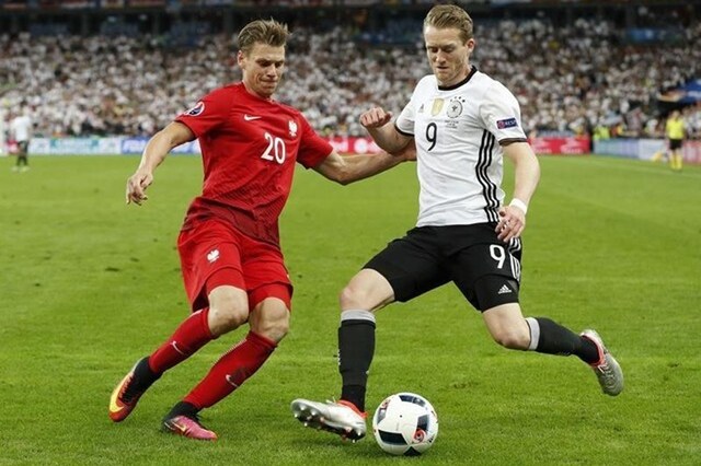 Germany's Andre Schurrle in action with Poland's Lukasz Piszczek in the Euro 2016 Group C match between Germany and Poland. (Reuters)