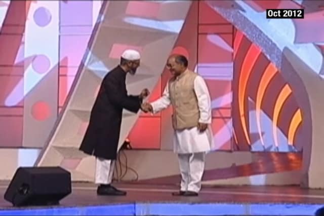 File image of Congress leader Digvijaya Singh with Zakir Naik