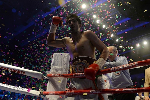 India's Vijender Singh after winning his maiden title as a professional boxer. (AFP)