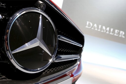 Daimler logo seen behind Mercedes' three-pointed star. (Photo: Reuters)