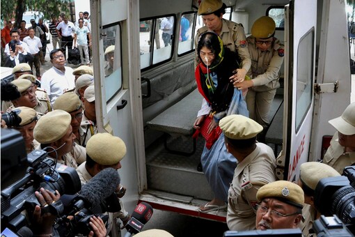Irom Sharmila being brought to the court in Imphal on August 9.  (PTI)