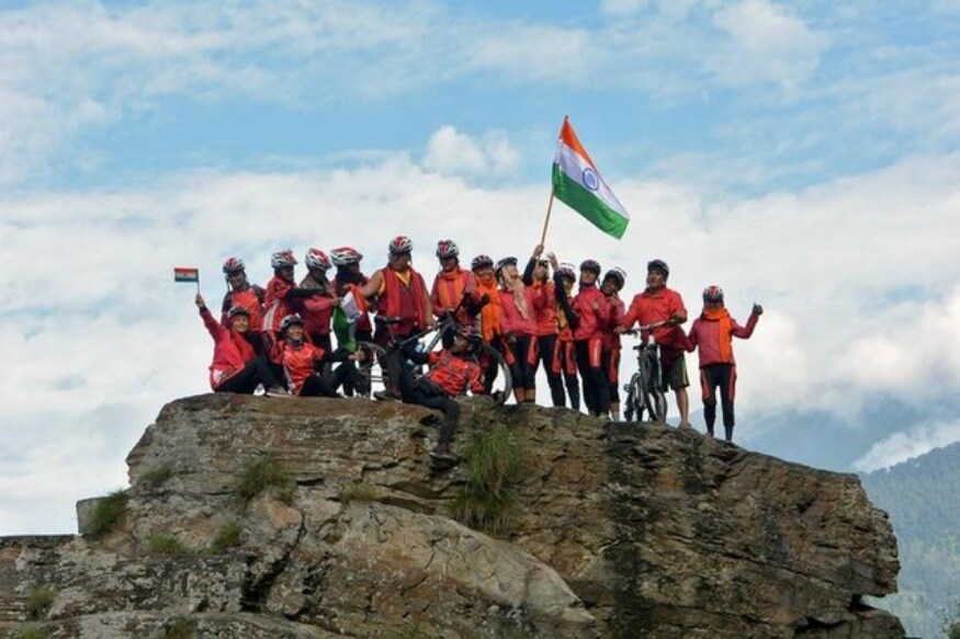 Photo: Reuters/Buddhist nuns from the Drukpa lineage pose for a picture in Himachal Pradesh during their cycle across the Himalayas to raise awareness about human trafficking.)