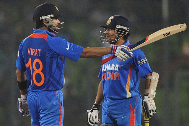 File photo of Virat Kohli and Sachin Tendulkar during India's match against Pakistan in the 2012 Asia Cup in Bangladesh (Getty Images)