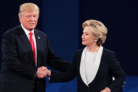 Republican presidential nominee Donald Trump (L) shakes hands with Democratic presidential nominee former Secretary of State Hillary Clinton during the town hall debate at Washington University on October 9, 2016 in St Louis, Missouri. (Photo:AP) Republican presidential nominee Donald Trump (L) shakes hands with Democratic presidential nominee former Secretary of State Hillary Clinton during the town hall debate at Washington University on October 9, 2016 in St Louis, Missouri. (Photo:AP)