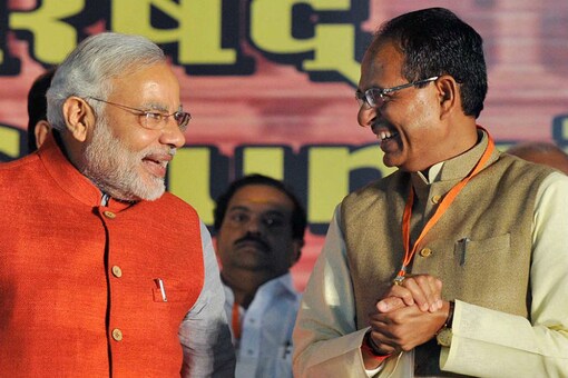 A file picture of Prime Minister Narendra Modi with Madhya Pradesh Chief Minister Shivraj Singh Chouhan. (Photo credit: Getty Images)