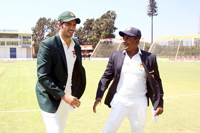 Zimbabwe captain Graeme Cremer with Sri Lanka captain Rangana Herath during the toss. (Getty Images)