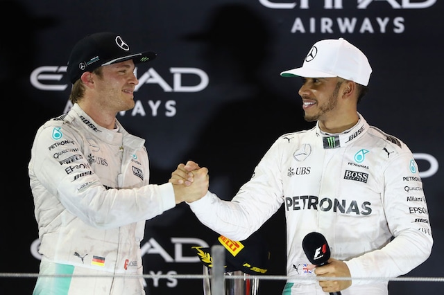 Nico  Rosberg and Lewis Hamilton shake hands on the podium at the 2016 Abu Dhabi Grand Prix. (Getty Images)