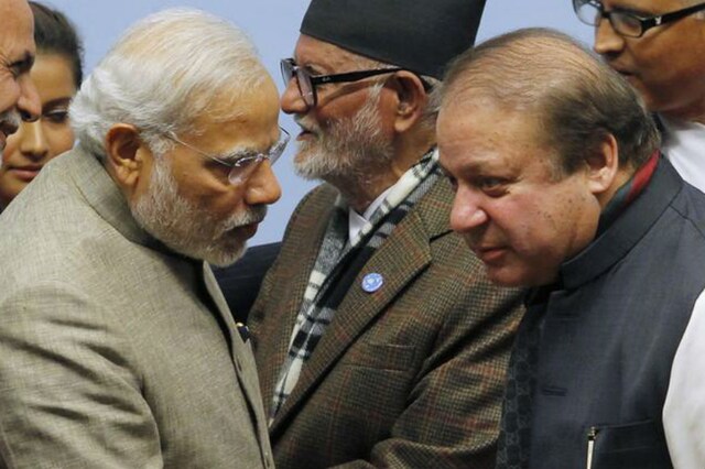 Prime Minister Narendra Modi talks to his Pakistani counterpart Nawaz Sharif during the closing session of 18th SAARC summit in Kathmandu on November 27, 2014. (Reuters)