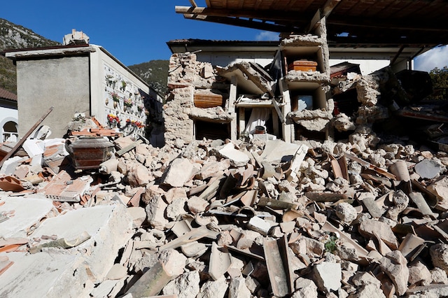Coffins at a collapsed cemetery of the village of Campi near Norcia, following an earthquake in central Italy. File photo. Image: Reuters