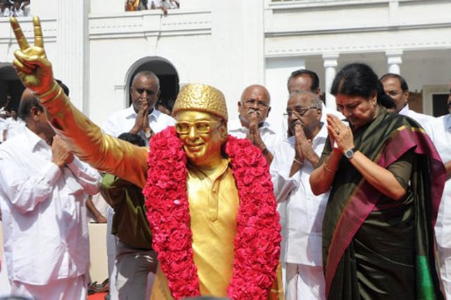 General secretary of AIADMK VK Sasikala  after garlanding party founder M.G. Ramachandran's statue on her arrival to take up office at the AIADMK headquarters in Chennai. (Image: AFP)