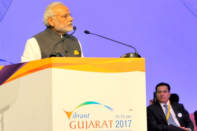 Prime Minister Narendra Modi speaks at the Vibrant Gujarat Global Summit 2017 in Gandhinagar on Tuesday. (PIB Photo)