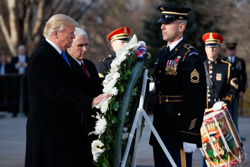 President-elect Donald Trump, accompanied by Vice President-elect Mike Pence places a wreath at the Tomb of the Unknowns (Photo: AP)