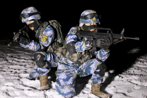 In this January 11, 2016, file photo, soldiers of the People's Liberation Army (PLA) Marine Corps are seen in training at a military training base in Xinjiang Uighur Autonomous Region. (Photo: Reuters)