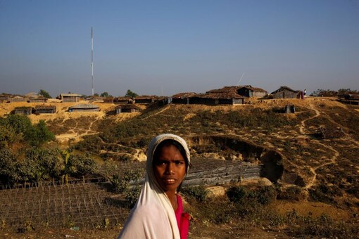 A Rohingya refugee girl reacts to the camera at Kutupalang Unregistered Refugee Camp, in Cox’s Bazar, Bangladesh. (Photo: REUTERS)