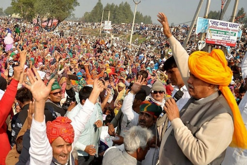 File photo of Jat agitation leader Yashpal Malik addressing supporters in Rohtak. (PTI)