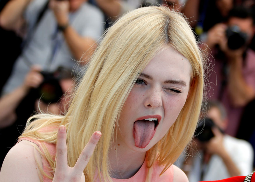 26. Cast member Elle Fanning poses at the screening of the film How to Talk...