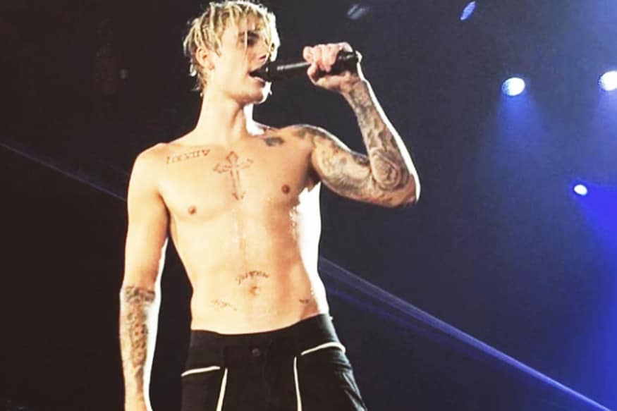 Justin Bieber Tattoo Tour Photos Meanings