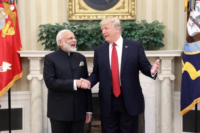 US President Donald Trump greets Indian Prime Minister Narendra Modi during their joint news conference in the Rose Garden of the White House in Washington. (Photo: PIB)