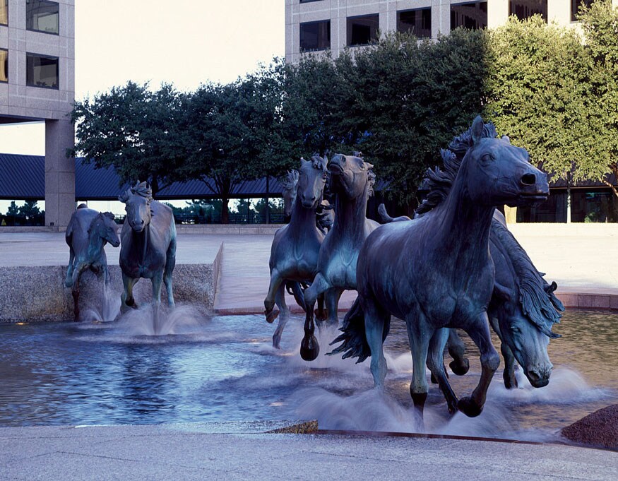 ‘Mustangs at Las Colinas’ by bronze sculptor Robert Glen. It commemorates the wild mustangs that historically roamed the surrounding area in Irving, Texas. (Image: Getty Images)