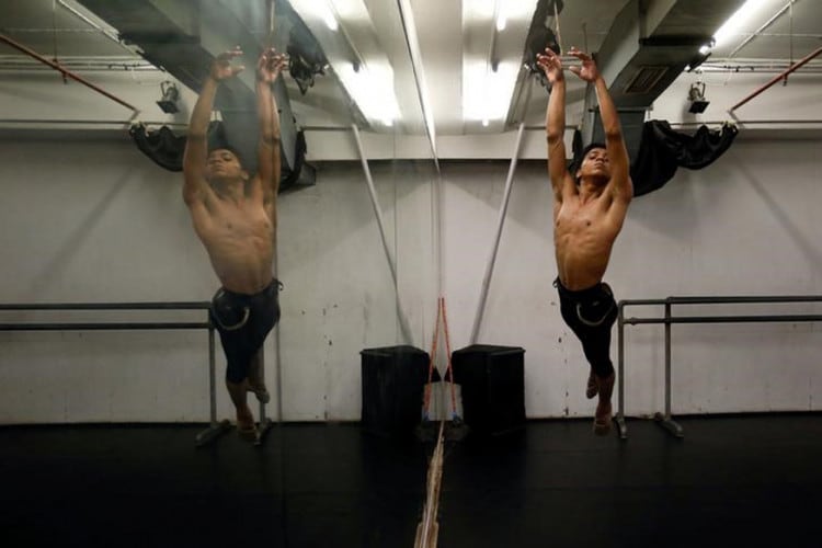 Amiruddin Shah, 16, takes part in a practice session at a dance academy in Mumba