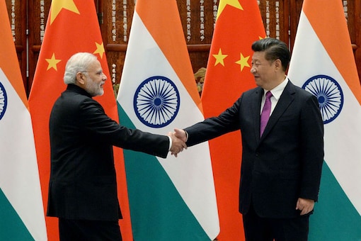 Prime Minister Narendra Modi shakes hands with Chinese President Xi Jinping. (Image: Getty Images)