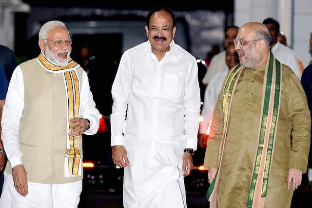 Union Minister M Venkaiah Naidu with Prime Minister Narendra Modi and BJP President Amit Shah. (PTI File Photo) 