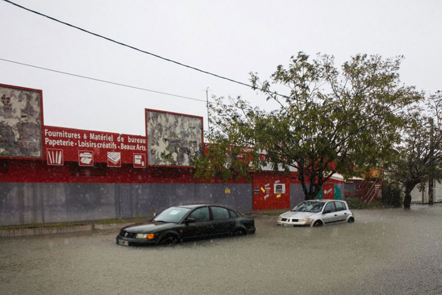 Flooded cars are pictured in the Lauricisque district of Pointe-a-Pitre on September 19, 2017 in the French territory of Guadeloupe, after the passage of Hurricane Maria. (Image: AFP)