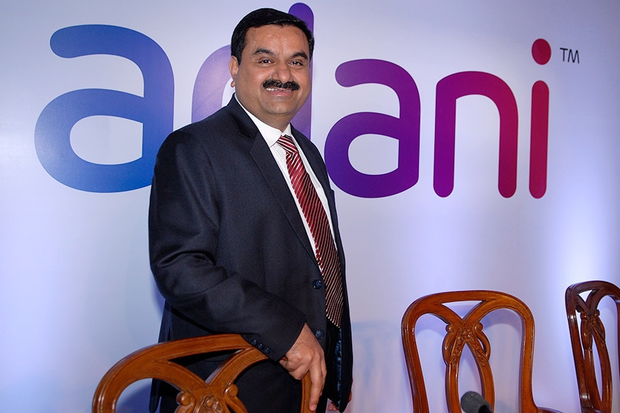 adani tops dhfl bid, says its bid gives maximum to lenders; rivals want it out of race