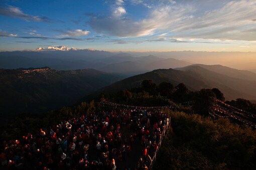 File photo of tourists watching the sun rise from Tiger Hill near Darjeeling. (Image: Reuters)
