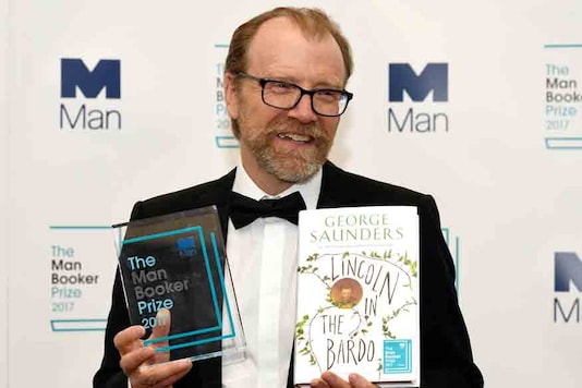 George Saunders, author of 'Lincoln in the Bardo', poses for photographers after winning the Man Booker Prize for Fiction 2017 in London. (Image: Reuters)
George Saunders, author of 'Lincoln in the Bardo', poses for photographers after winning the Man Booker Prize for Fiction 2017 in London. (Image: Reuters)